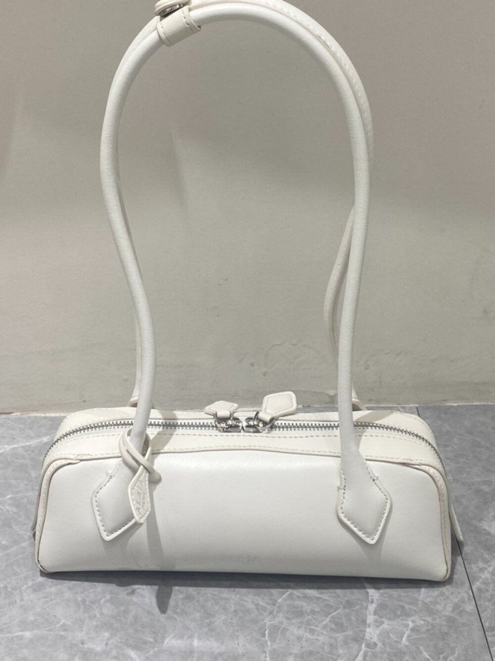 Alaia Le Teckel White Sausage Bag
